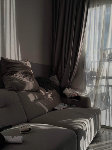 A messy living room but when combine with those sunlight and shadow it make this photo feel like is an art